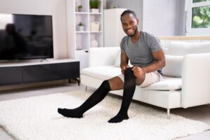 Leg compression sock peripheral artery disease treatment help improve circulation